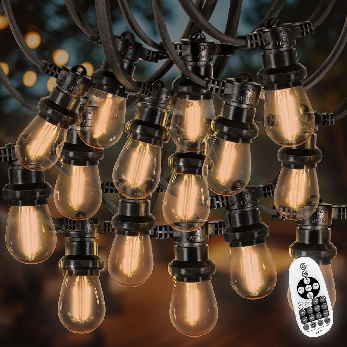 Guirnalda LED exterior - 100 m con 100 bombillas E27 de filamento ámbar y 2700 K - Brillo regulable con mando a distancia - 230 V para jardín terraza fiesta y eventos