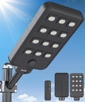 JAYNLT X 13000W farola solar exterior - Luz blanca fría de 6500 K con sensor de movimiento - Aluminio negro con protección IP67 - Para parque infantil carretera y garaje
