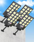 JAYNLT pack de 4 farolas solares - Luz de 6500 K con 5 modos de iluminación - Sensor de movimiento y diseño negro moderno - Para jardín patio tienda y seguridad exterior